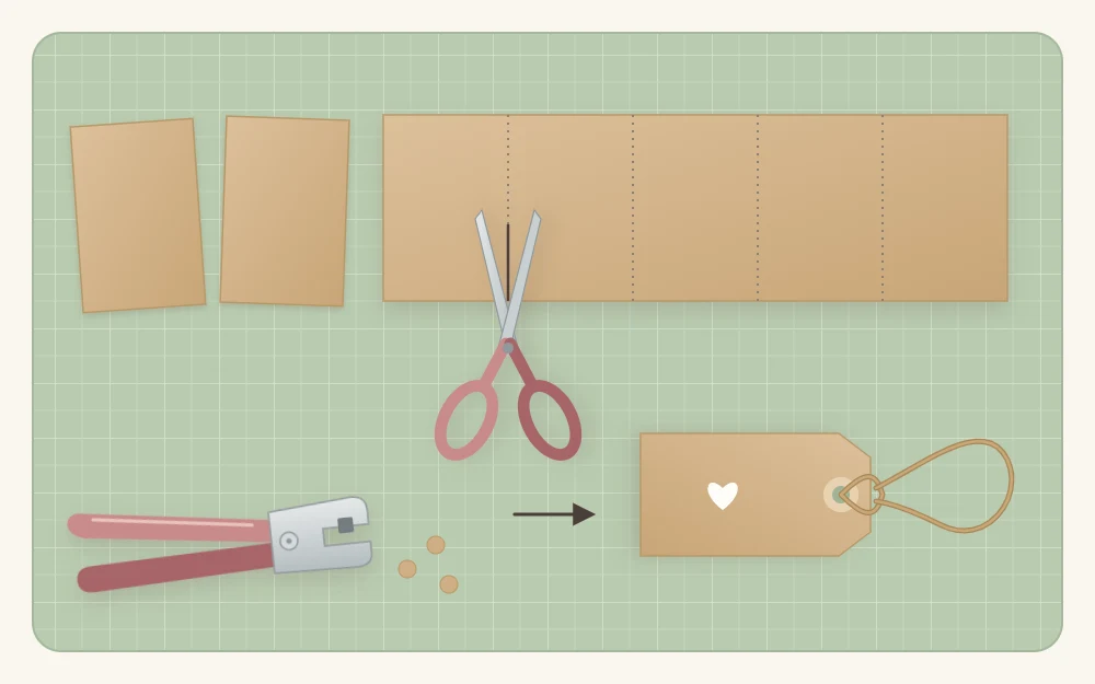 A strip of cardstock being cut into equal tags beside a hole punch and one finished tag threaded with looped twine