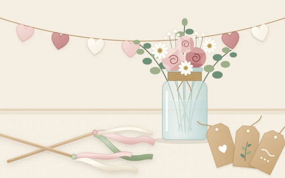 Two ribbon wands, a twine-wrapped glass jar with flowers, kraft favor tags and a short paper heart garland on an ivory table