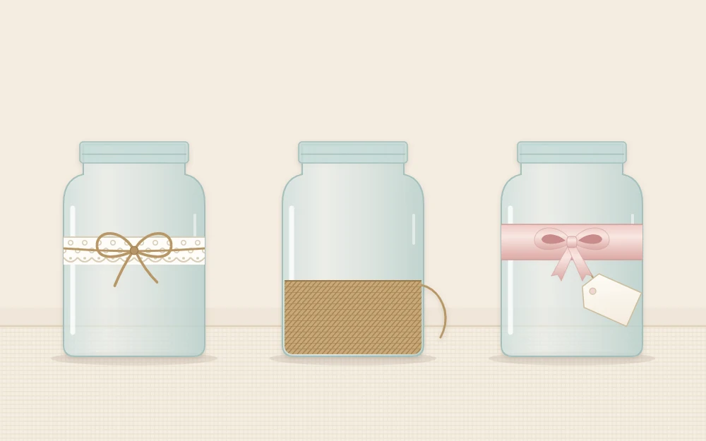Three decorated empty glass jars in a row with a lace band, twine wrapping and a ribbon band with a small tag